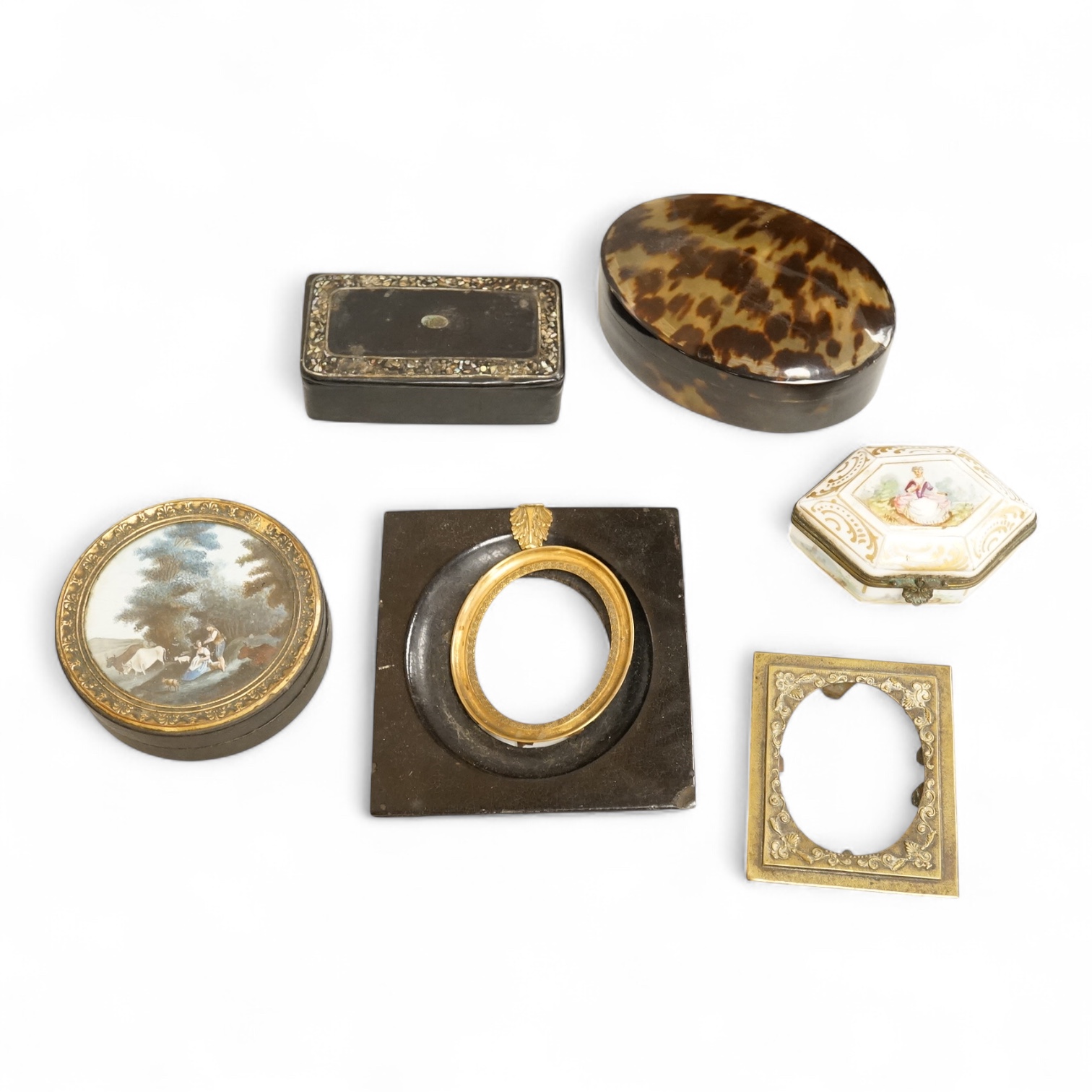A collection of 19th century and later snuff and pill boxes, a silhouette frame and a gilt metal frame